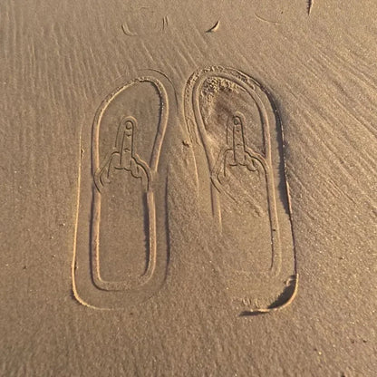 Quirky flip-flops featuring a middle-finger design